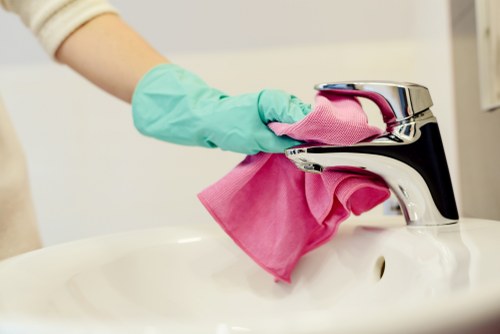 Professional upholstery cleaning in Colindale for a bright sofa